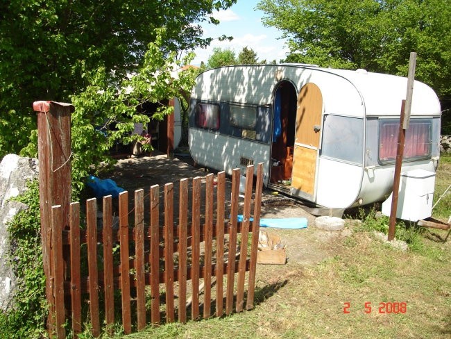 Trailers behind the fence.