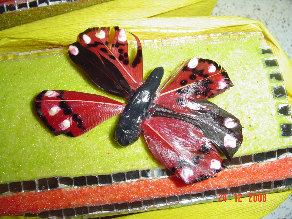 metuljček iz das mase in perja