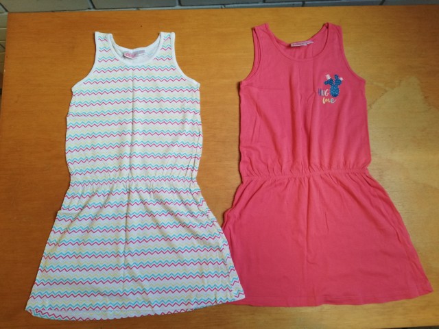 2x nova obleka 128 = 3 eur komplet