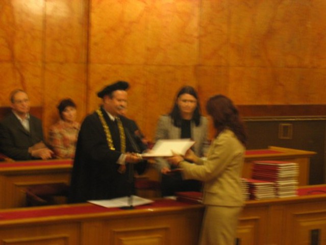 Receiving the Diploma